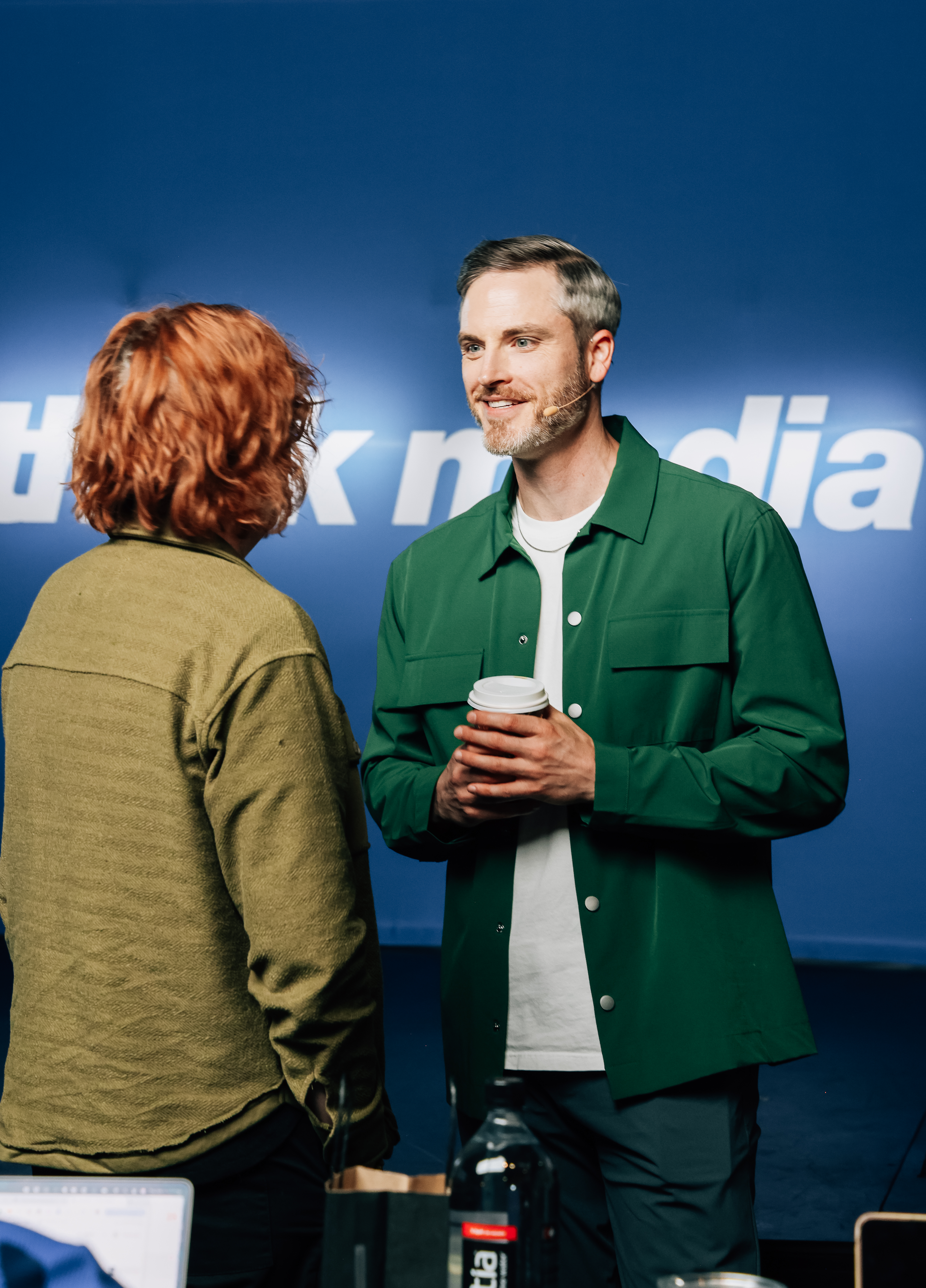 Sean Cannell talking with a student at Think Media Mastermind